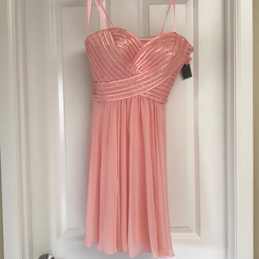 Light pink dress with jeweled and striped top